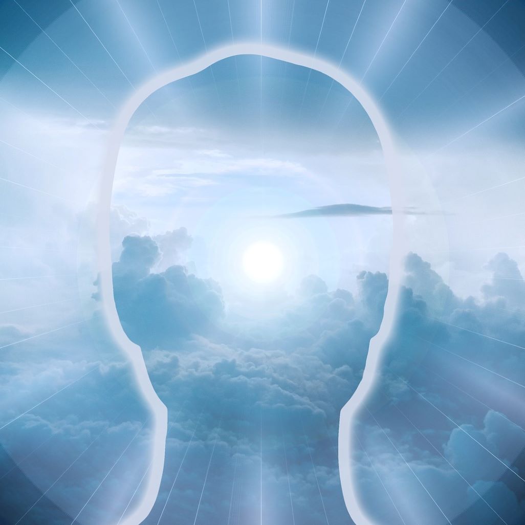 Reiki and Psychic Energy head outline with glowing light