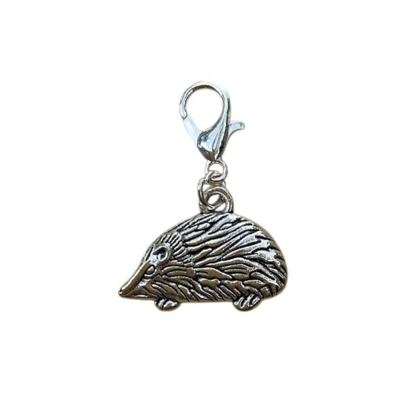 Hedgehog Animal Guide Charm symbolizing boundaries, protection, and quiet resilience, for boho necklaces and energy crystal bracelets.