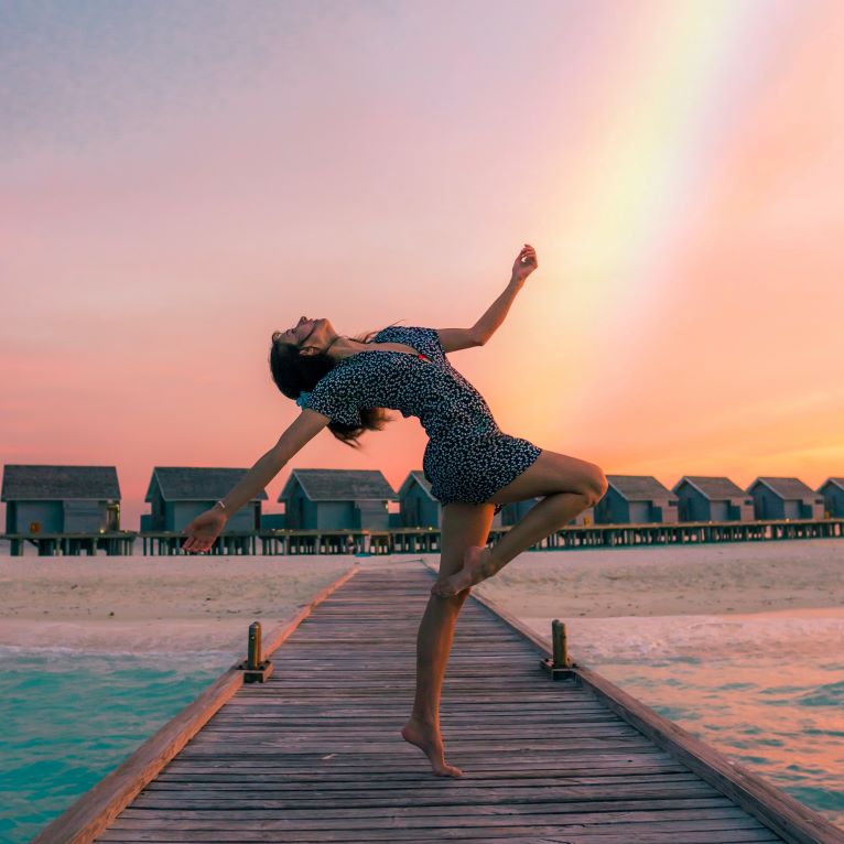 Aura Colors Woman dancing with rainbow