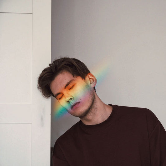 Seeing Auras man with rainbow over eyes