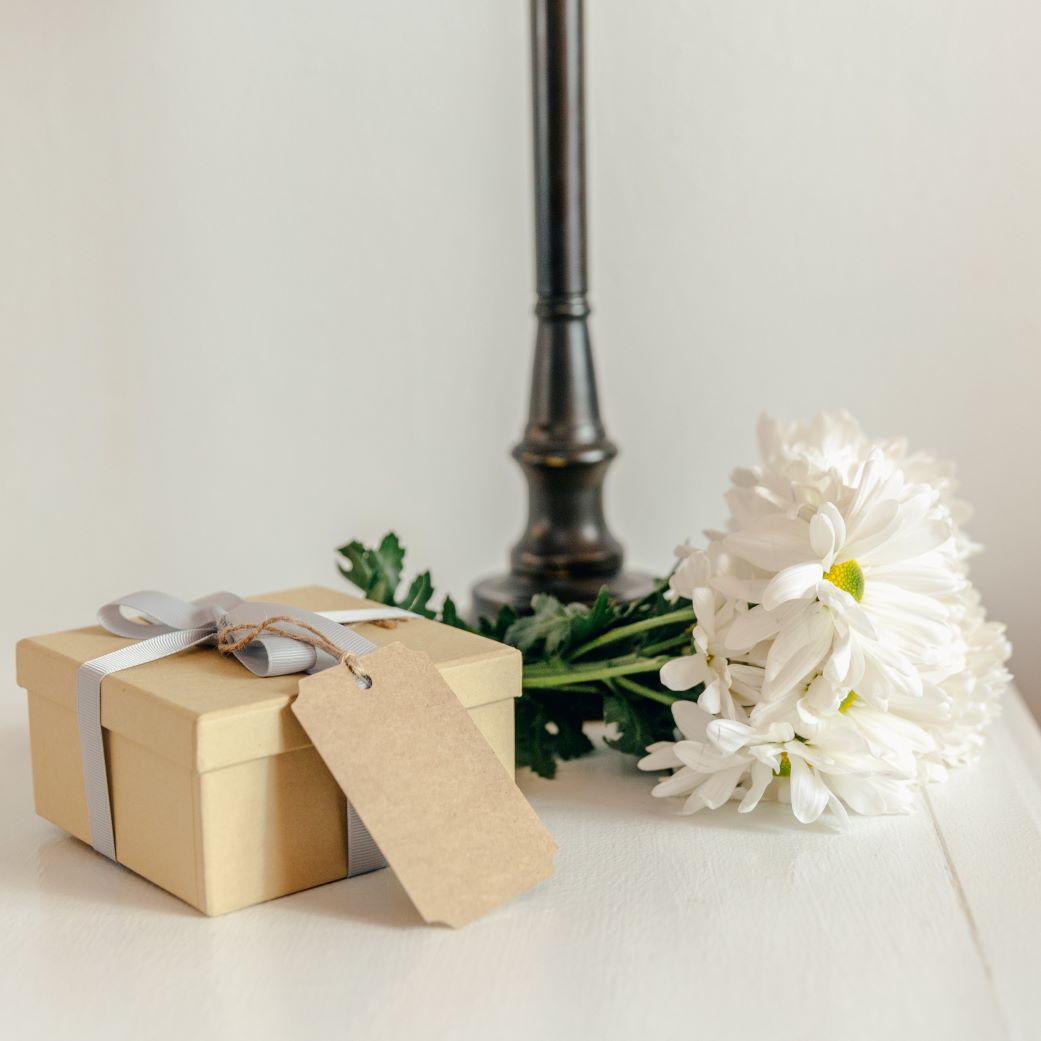 Metaphysical Gift Boxes Minimalist Wrapping with Flowers