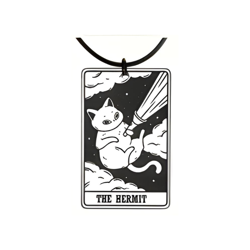 Cat-themed pendant with 'The Hermit' text on a white background
