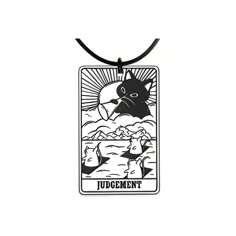 Black and white tarot card design with a cat and mountain landscape on a white background
