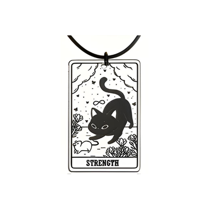 Black cat pendant with 'Strength' text on a white background