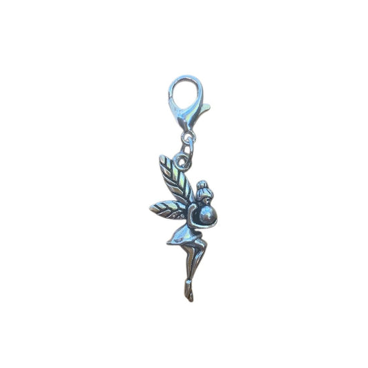 Fairy charm with a clip on a white background