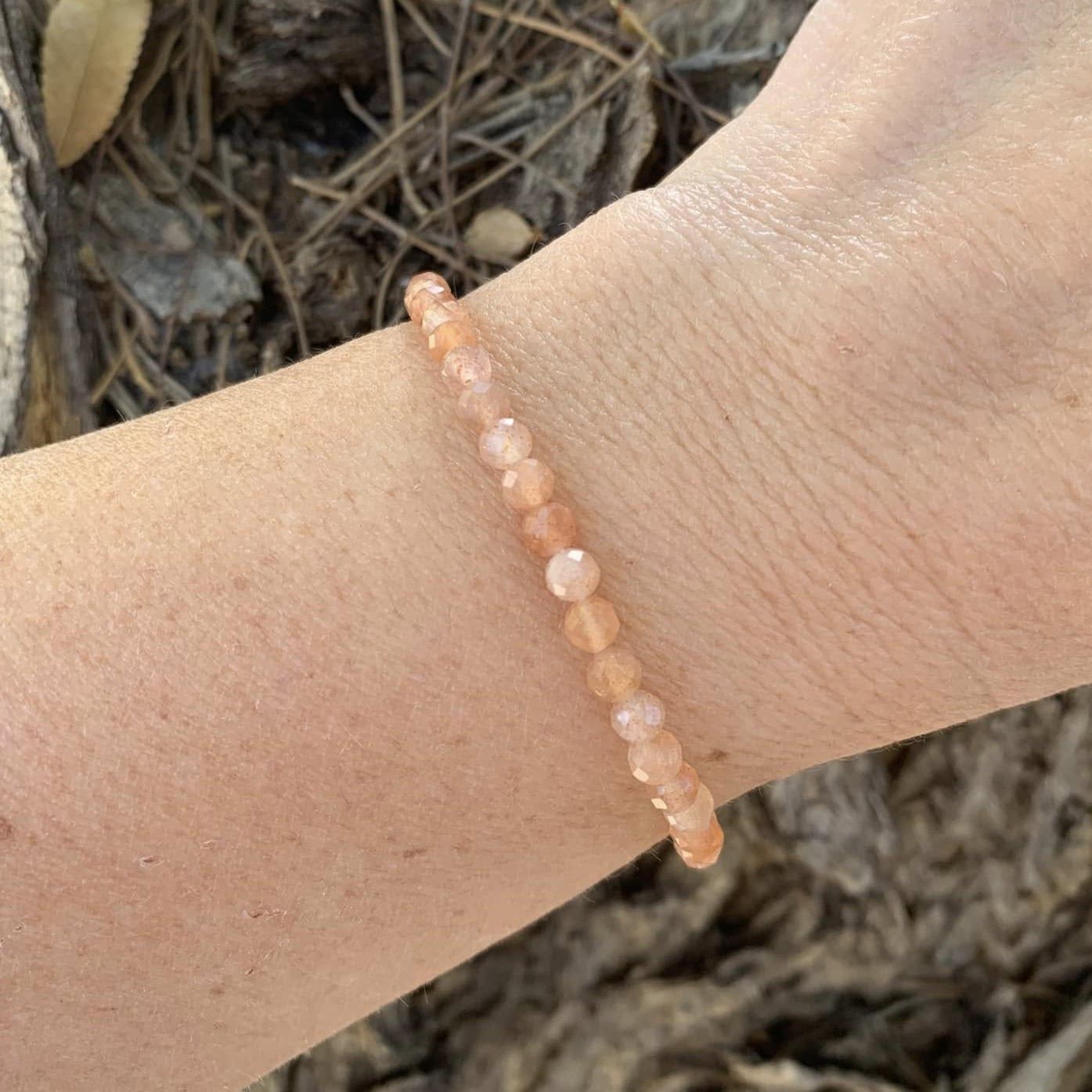 Sunstone Dainty Stackable Bracelet on Wrist