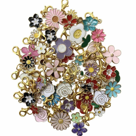 Wholesale Flower Charms bundle of 10 colorful enamel flowers with gold-tone finish, symbolizing growth, beauty, and renewal.